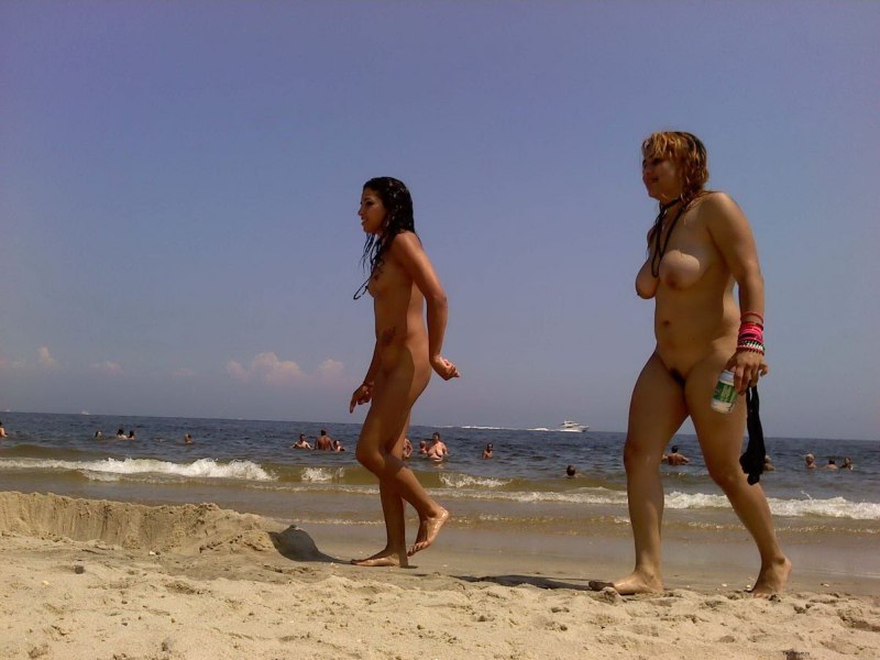 Amateur girls caught sunbathing naked on the nudist Beaches